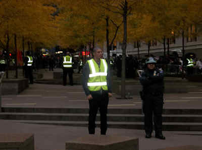 Security guard and cops inside park - Zucotti Park - Occupy Wall Street