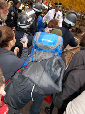 Woman takes pictures and is swarmed by cops - Zucotti Park - Occupy Wall Street